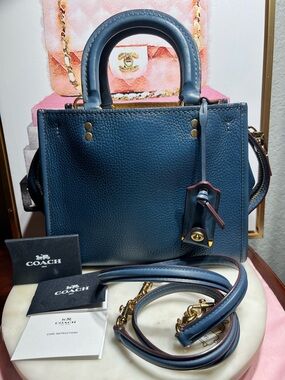 Coach Rogue 25 satchel icrafted in pebbled leather.